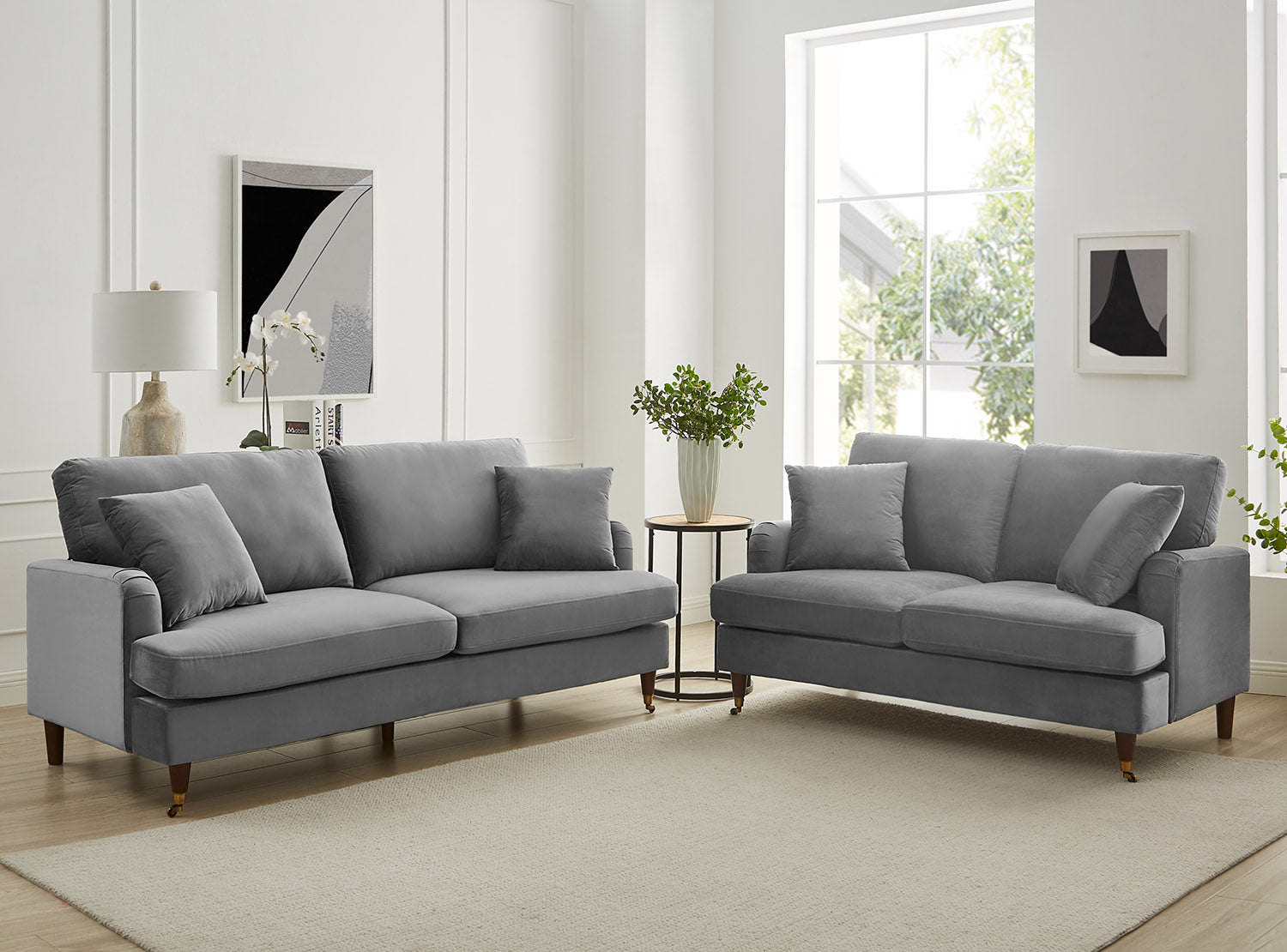 Brigette 2-Seater Grey Velvet Sofa with Antique Brass Castor Legs