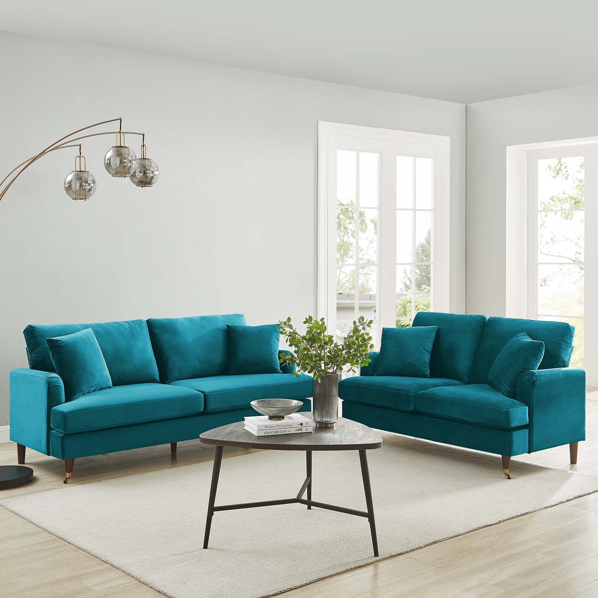 Brigette 2-Seater Teal Velvet Sofa with Antique Brass Castor Legs